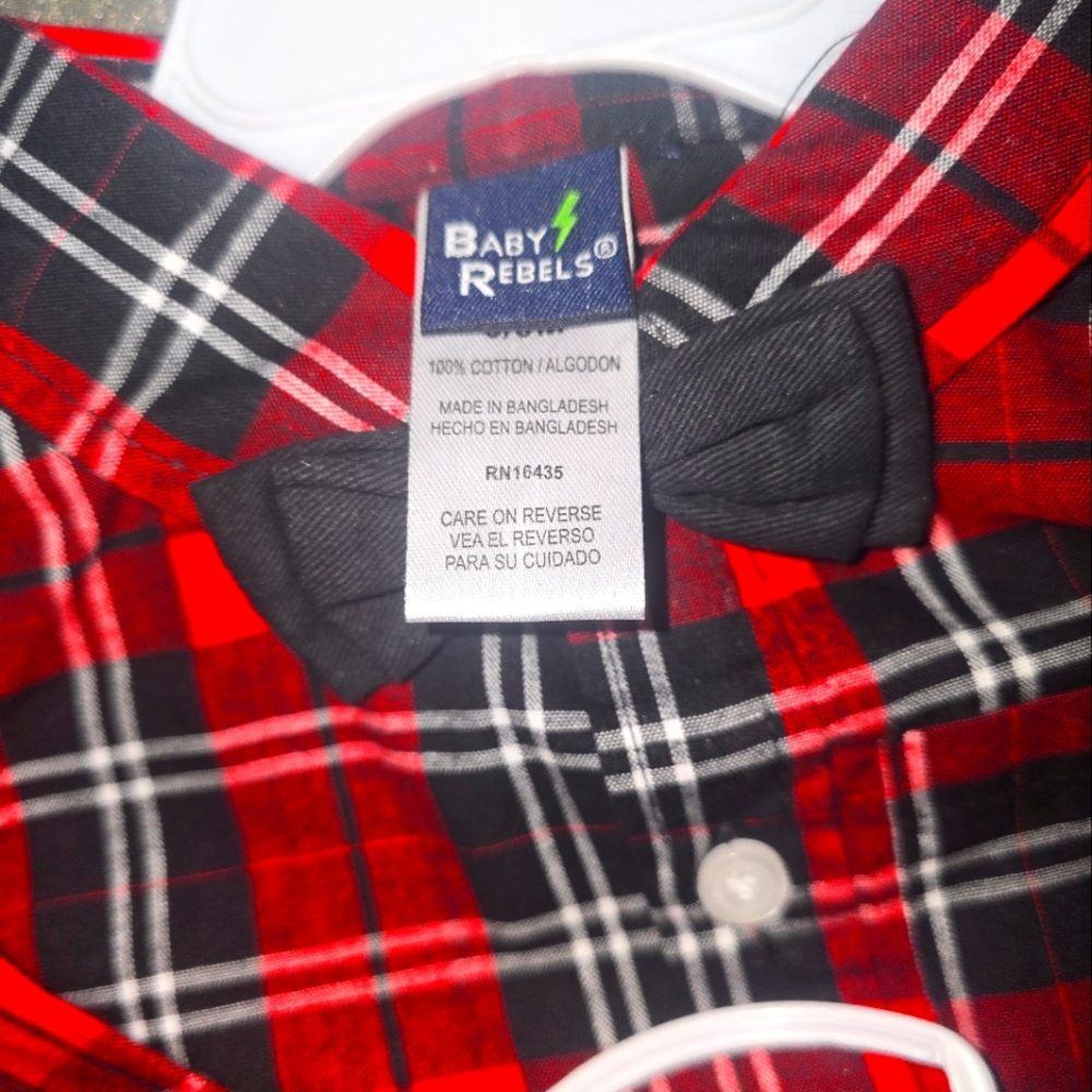 Plaid long sleeve shirt with bow tie and black pants
